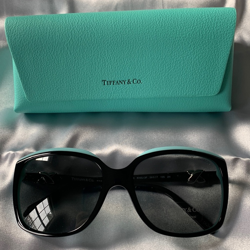 BRAND NEW NEVER WORN Tiffany & Co. sunglasses! Black frame with blue on the top.
